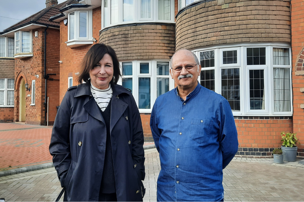 Cllr Jayne Francis with Mr Nasir Whaind who lived next door to an empty home that he reported to the council.